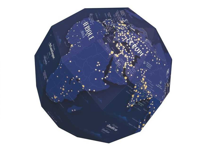 The Earth at Night is an illustrated globe created for Poppik, revealing the geography of our planet through light.  By day, the globe presents the familiar contours of continents and oceans. In the dark, inhabited regions emerge, tracing a luminous map of human presence across the Earth.  Atelier Cartographik brought together cartography, illustration and visual storytelling to create a geographic object that is both educational and poetic — inviting children to discover the world from a different perspective.